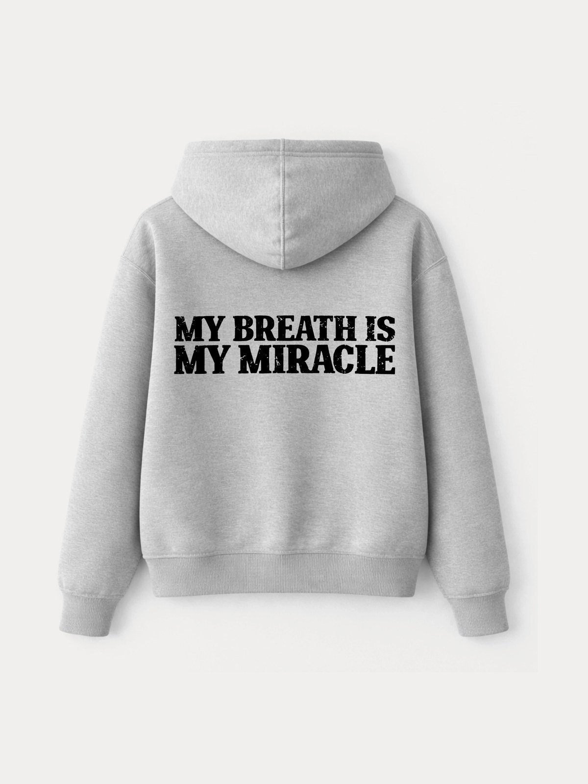 The zip hoodie from the back, the black MY BREATH IS MY MIRACLE print across the shoulders